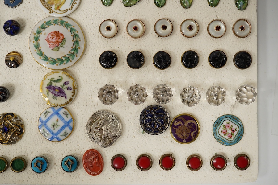 A collection of early 20th century buttons, including agate, ceramic and enamel, largest 43mm. Condition - good